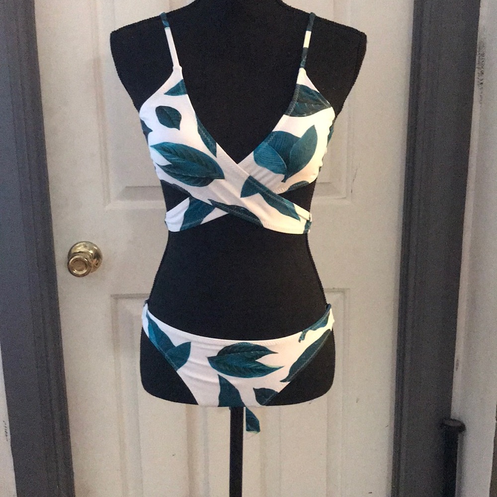 White bathing suit with leaves